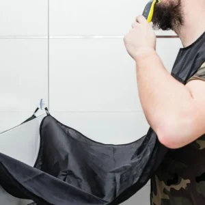 Fekete borbély kötény borotválkozáshoz és szakáll nyíráshoz